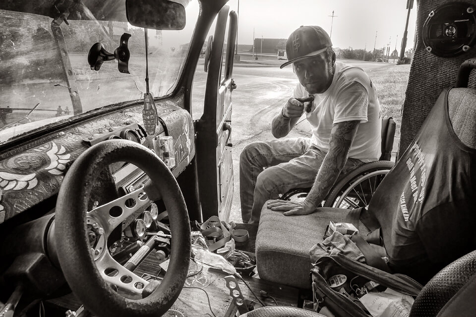 Redneck rumble guy in car bw